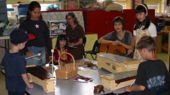 LCH children practice with Orff instruments.