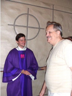 Intern Josh greets Bob Zimmer after the service.