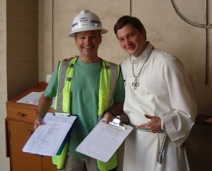 Foreman Jim Sullivan and Intern Josh recruit volunteers for the demolition.