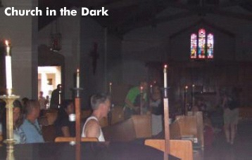 Worship in the Nave darkened by the power outagee.