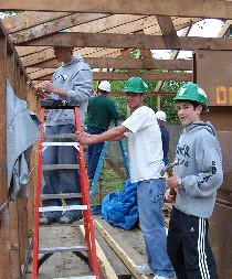 Youth involved in a Habitat for Humanity work project