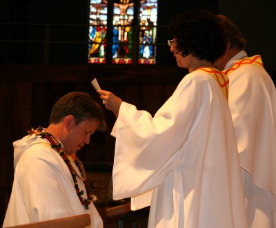 Jacob Burkman receives a blessing before leaving for Seminary, May 20th.