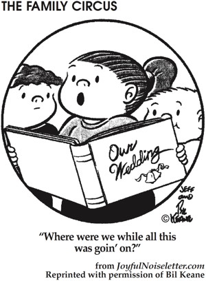 Cartoon: Child looks at parent's wedding album and says 'Where was I?'