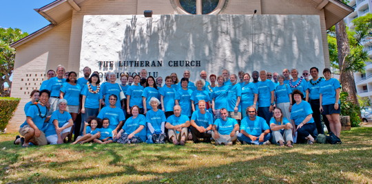Members of the congregation in their Carl Crosier Commemorative T-shirts.