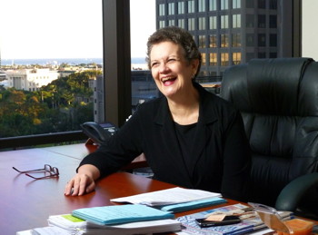 Mary Fastenau at her desk at her 