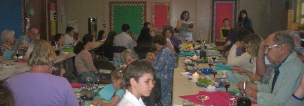 A large group—spanning several generations—gathered for the Seder Meal, led by the child
