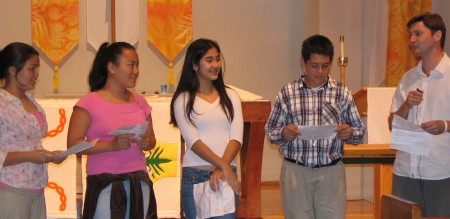 Intern Pastor Josh and recent confirmands lead the liturgy of confirmation of affirmations