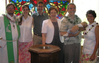 Pastor Jeff, the D'Evelyns, sponsor Olivia Castro, and Sean's parents pose with the the newly baptized