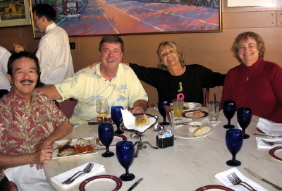 Paul Fujii, Brian Weis, Peggy Anderson, and Jeanette Hanson enjoy conversation before dinner.