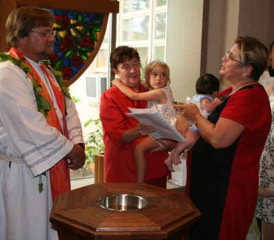 Linda Miller presents a shell for baptism