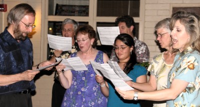 Members of the LCH choirs singing a special birthday song