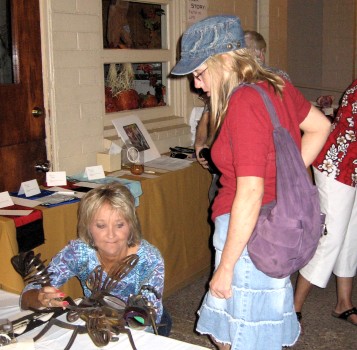 Examining items offered in the silent auction