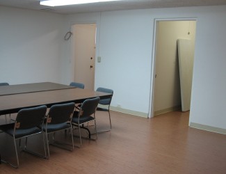 The Boardroom after the flooring had been  flooring and lighting had been installed.