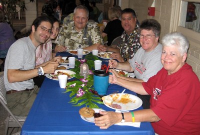 Enjoying potluck supper