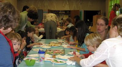 Sunday School children decorating cookies