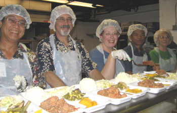 Jimmy Castro, Bill Potter, Olivia Castro, Rudy Riingen, and Mary-Jo Estes serving dinner at IHS.