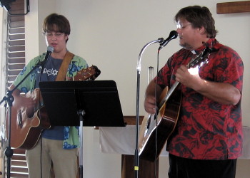 Seth and Pastor Jeff leading the opening hymn