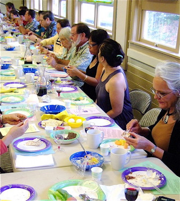 Members of the congregation eat their Seder Meal