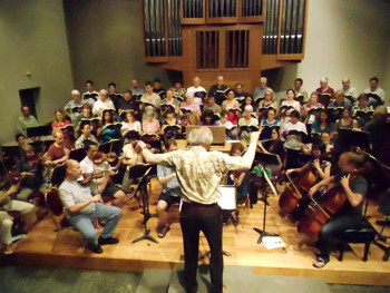 Carl Crosier conducts one of the final rehearsals for Bach's B-Minor Mass