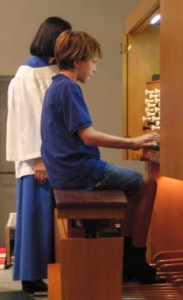 Jordan M. plays the Beckerath organ for Children’s Sabbath