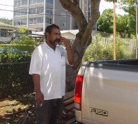 Contractor Hamilton Finau supervises the work.