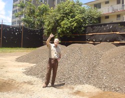Dirt is delivered so that the lot can be leveled.