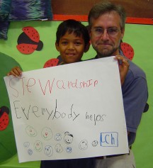 Michael Althauser displays his poster, 'stewardship--everybody helps.'