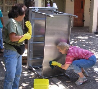 Carolyn Ishikawa and Mary Jo Estes clean one of the new counters