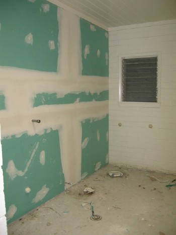Men’s rest room with “green board” installed. Men’s rest room with “green board” installed.