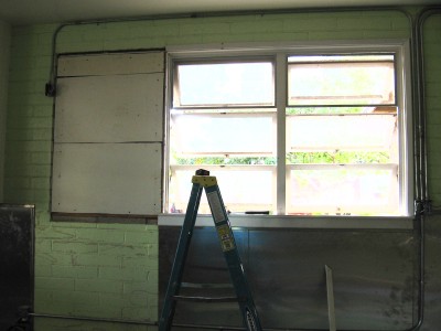 The window space has been filled in to hold the range hood.