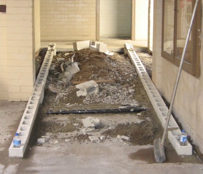 The ramp area is cleaned up and blocks put down for the sides of the new ramp. The ramp area is cleaned up and blocks put down for the sides of the new ramp.