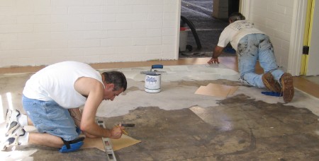 Jim Sullivan and Francisco Barajas putting down the linoleum Jim Sullivan and Francisco Barajas putting down the linoleum
