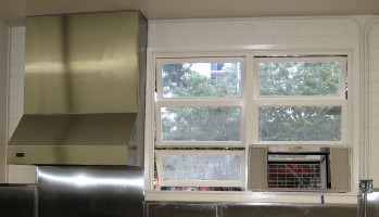 They finished off the exhaust hood for the stove and began to put in the air conditioner