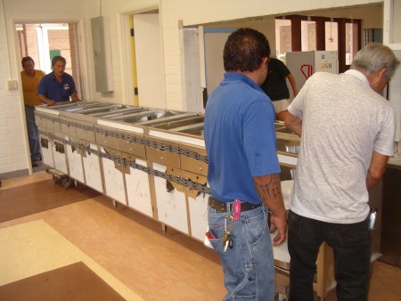 The contractors rolled in the custom-made counter for the space under the pass through The contractors rolled in the custom-made counter for the space under the pass through