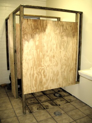 Women’s rest room with temporary partitions.