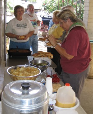 Jeanette Hanson watches over the lunch line
