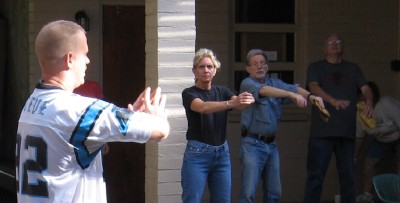 Steve Schmidt leads the group in stretching