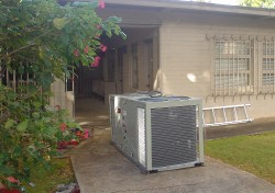 The new air conditioning ready to be moved into place and installed 