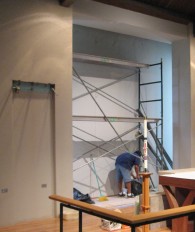 Work nears completion and the plywood comes down.