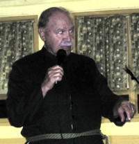 Brother Martin entertains the crowd after dinner