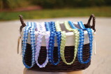 a basket of In Stitches ribbon lei