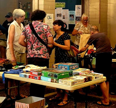 Shoppers at the last free store.