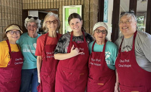 Smiles and service! Our amazing volunteers making a difference, one warm meal at a time at One Pot, One Hope. Smiles and service! Our amazing volunteers making a difference, one warm meal at a time at One Pot, One Hope.