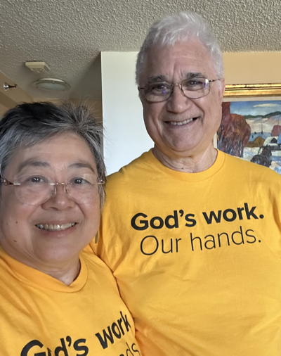 Cathy and Stan Baptist proudly wear the “God’s Work. Our Hands” shirts and are ready to serve up good vibes, good work, and good people! Cathy and Stan Baptist proudly wear the “God’s Work. Our Hands” shirts and are ready to serve up good vibes, good work, and good people!