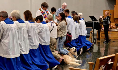 Pets join those receiving communion