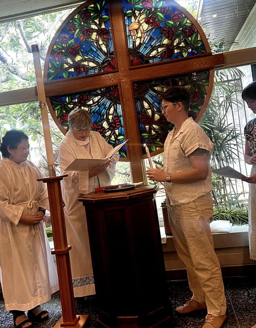 A beautiful moment at the baptismal font, welcoming our newest member into the family of faith.
