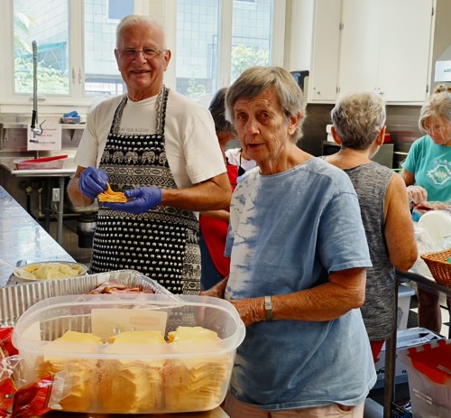 Marlise and Roy at June's IHS sandwich making event.
