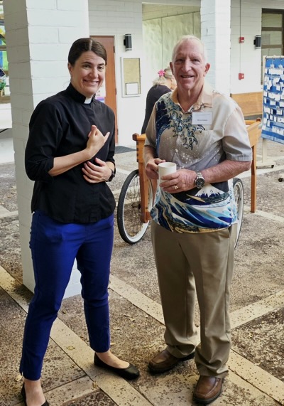 Rev. Christina and Pastor Steve pose in the Courtyard after worship.