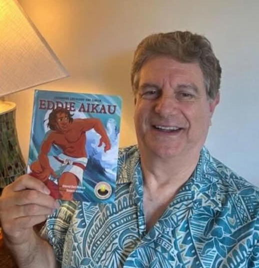 David with one of his books