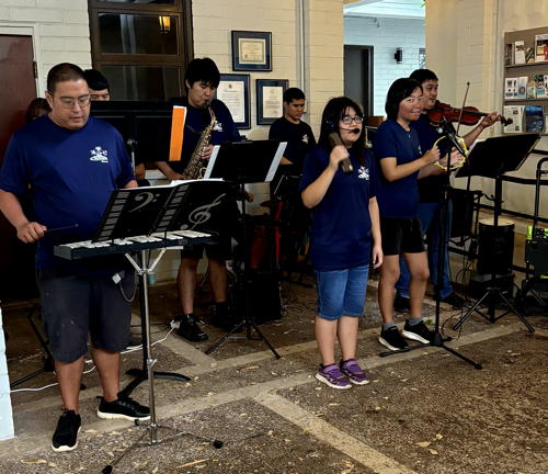 The Mele Makana perform at the our LCH Free Store.